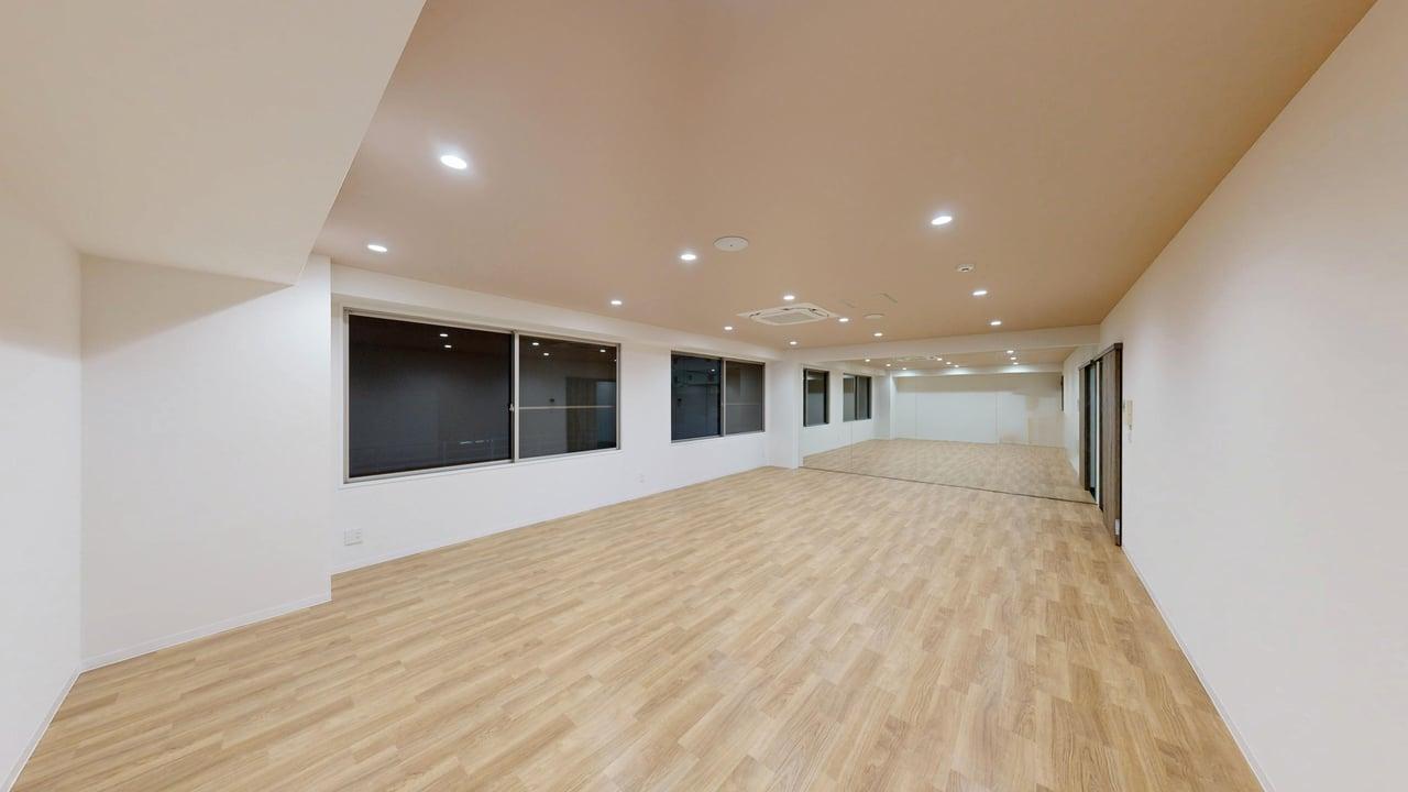B.A.D. STUDIO: a multi-purpose room with a full mirror wall and sports flooring